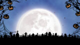 image of jack o lanterns hanging on branches halloween cemetery and moon on blue background