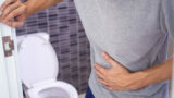 逗子市の整体・カイロプラクティックで改善する過敏性腸症候群（IBS）のイメージ、腹痛で苦しむ人
